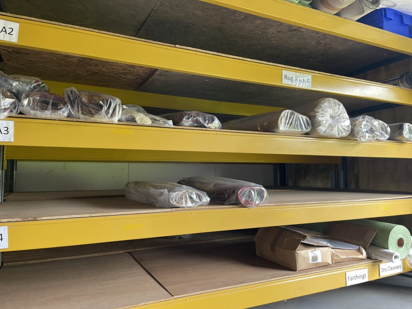 Rugs waiting to go out for delivery after being cleaned